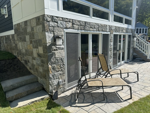 Stone veneer installed on residential home exterior