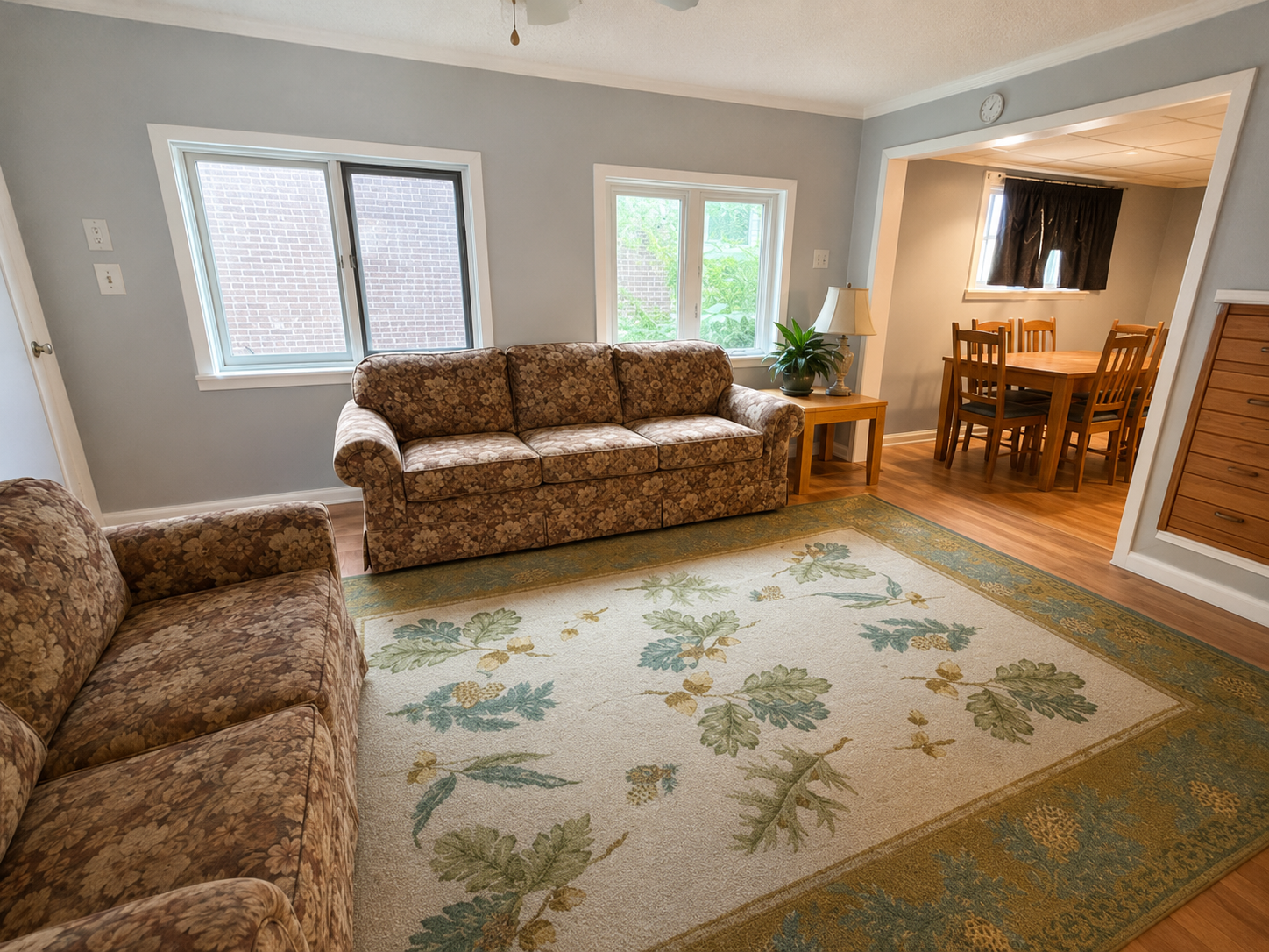 Furnished living room and dining area in the housing